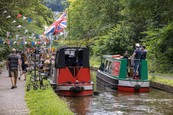 TREVOR WREXHAM, WALES - JULY 15 : People enjoying the LLangollen Canal near Trevor, Wrexham, Wales, UK on July 15, 2021. Unidentified people