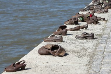 Iron shoes memorial to Jewish people executed WW2 in Budapest clipart