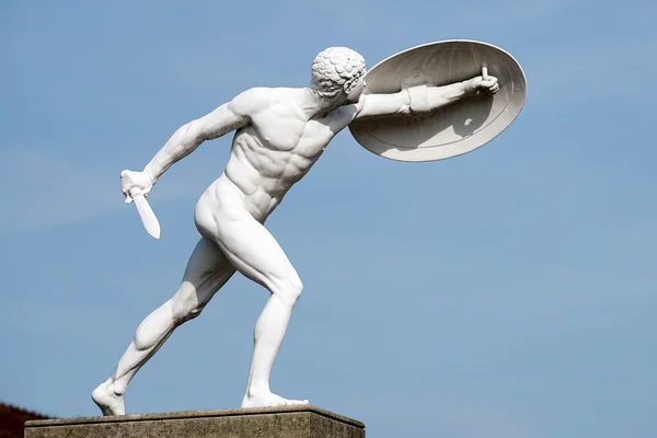 Statue of a naked male warrior at the Charlottenburg Palace in B — Stock Photo, Image