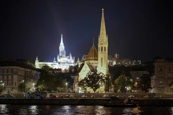 Calvinist and Matthias Churches illuminated in Budapest — Stock Photo, Image