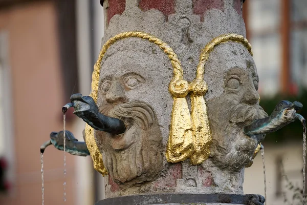 Unusual water spout in Rothenburg — Stock Photo, Image