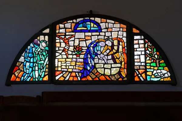 Stained glass window Church of St. John the Baptist in Cannigion — Stock Photo, Image