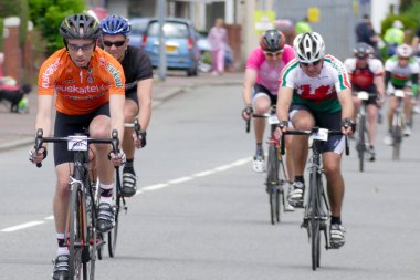 Cyclists participating in the Velethon Cycling Event in Cardiff  clipart