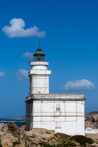 Fyren på capo testa Sardinien den 21 maj 2015 — Stockfoto