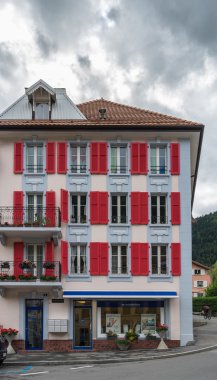 VALLORBE,/ EUROPE - SEPTEMBER 14: Building with red shutters in