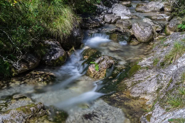 Tiny waterfalls at the Val Vertova torrent Lombardy near Bergamo — Stock fotografie