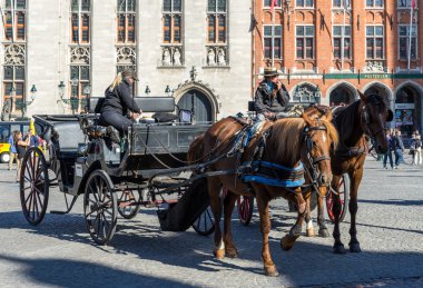 BRUGES, BELGIUM/ EUROPE - SEPTEMBER 25: Horses and carriages in