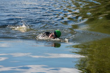 BRUGES, BELGIUM/ EUROPE - SEPTEMBER 26: Person swimming down a c