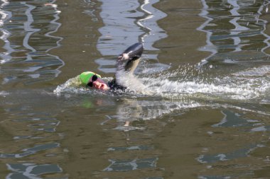 BRUGES, BELGIUM/ EUROPE - SEPTEMBER 26: Person swimming down a c