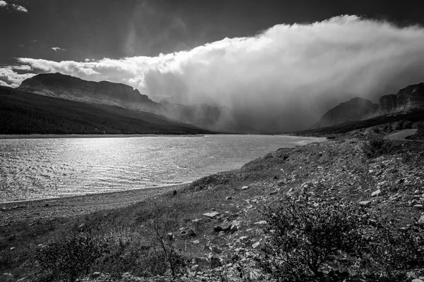 Storm clouds gathering over Lake Sherburne — Stock Photo, Image