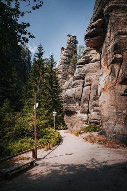 Tourist track in Adrpach Teplice Rocks which are an unusual set of sandstone formations clipart