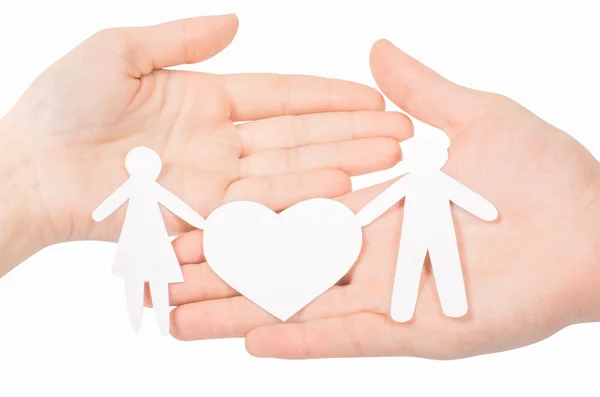 Famiglia di carta con cuore in mano — Foto Stock