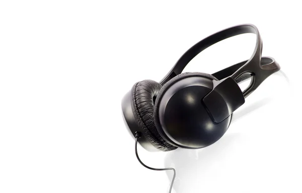 Black headphones isolated — Stock Photo, Image