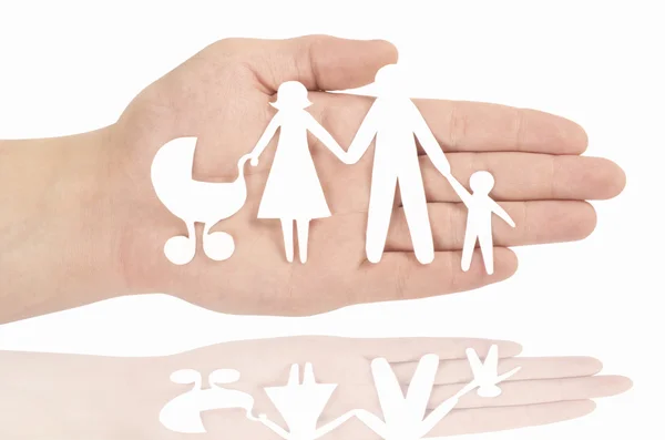 Papier familie in de hand — Stockfoto