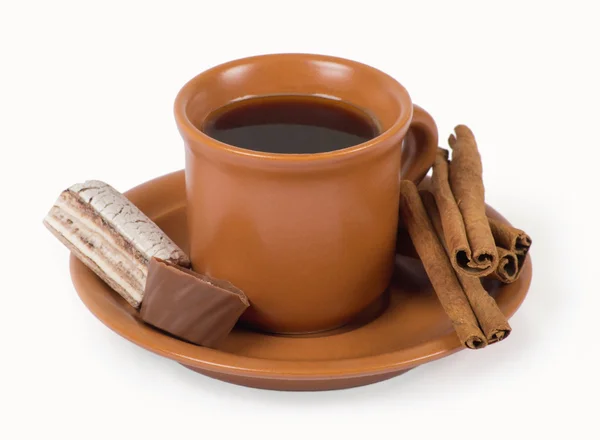 Cup of italian espresso with cinnamon and candy — Stock Photo, Image