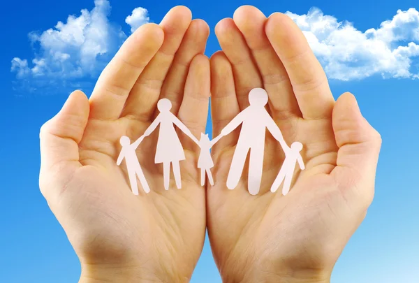 Paper family in hands — Stock Photo, Image