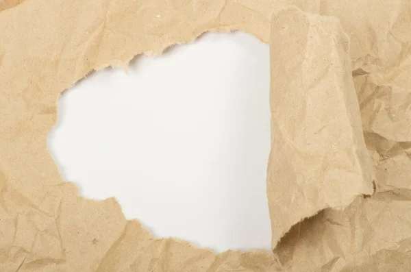 Ripped paper against a white — Stock Photo, Image