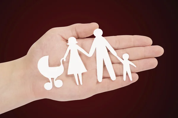 Paper family in hands — Stock Photo, Image