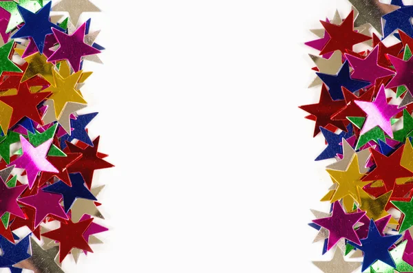 Цветные звезды на белом — стоковое фото