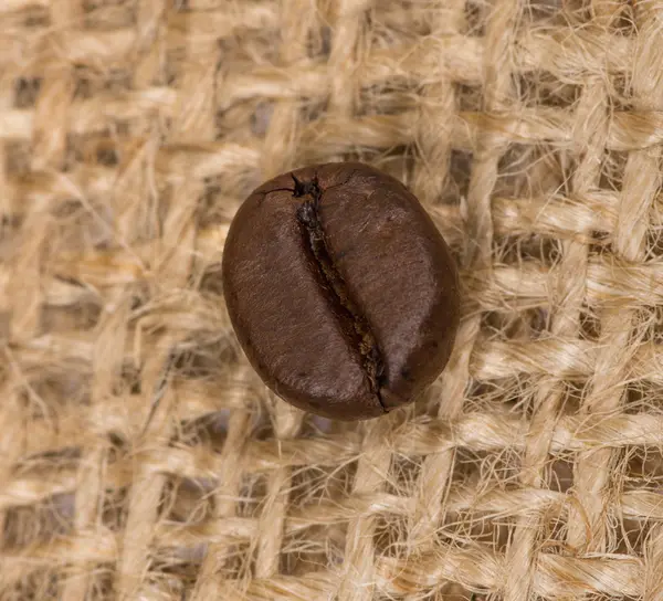 Coffee bean on sack — Stock Photo, Image