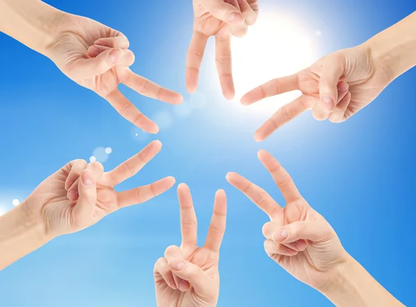 Hands forming the star shape — Stock Photo, Image