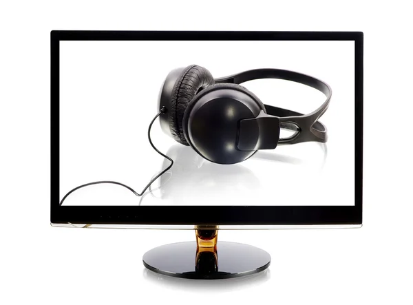 Headphones in monitor — Stock Photo, Image