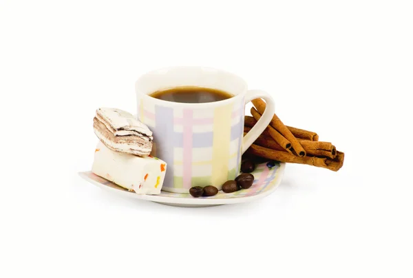 Coffee cup with sweets an cinnamon — ストック写真