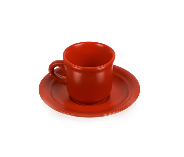 Taza roja en un platillo rojo — Foto de Stock