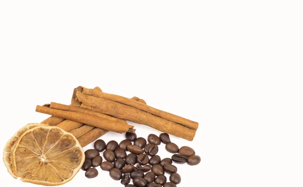 Granos de café, canela y limón — Foto de Stock