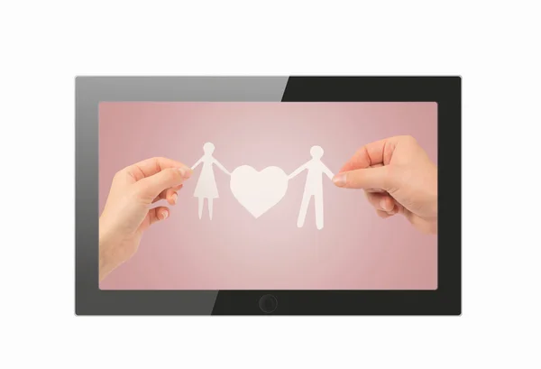 Tablet pc with paper family on the screen — Stock Photo, Image