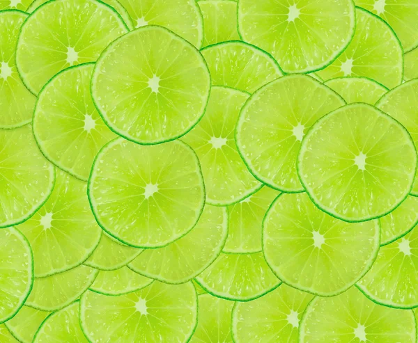 Pozadí zelené citrusové řezy — Stock fotografie