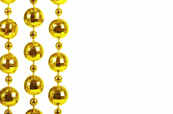 Brilliant celebratory beads of golden color — Stock Photo, Image