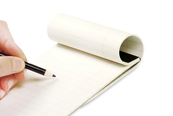 Potlood in de hand schrijven op de notebook — Stockfoto