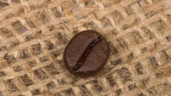 Coffee bean on sack — Stock Photo, Image