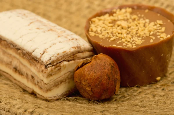 Nut and sweets on burlap — Stock Photo, Image