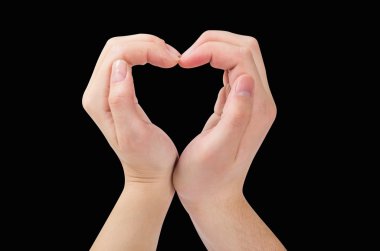 İki el bir kalp şekli oluşturan