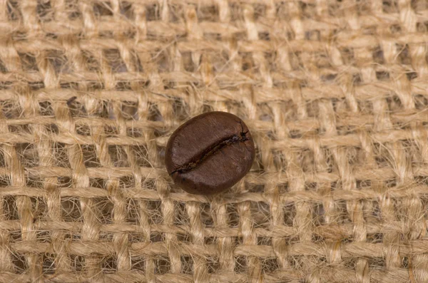 Coffee bean on sack — Stock Photo, Image