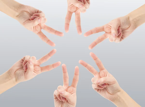 Hands forming star shape — Stock Photo, Image