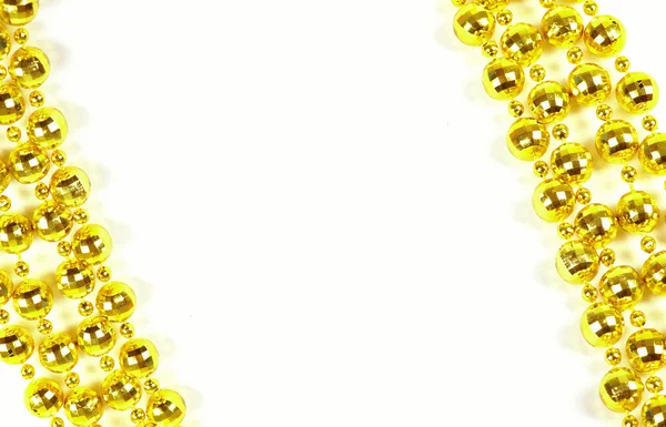 Golden beads with empty copy space — Stock Photo, Image