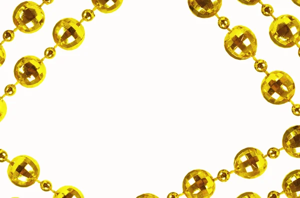 Perline dorate con spazio di copia vuoto — Foto Stock