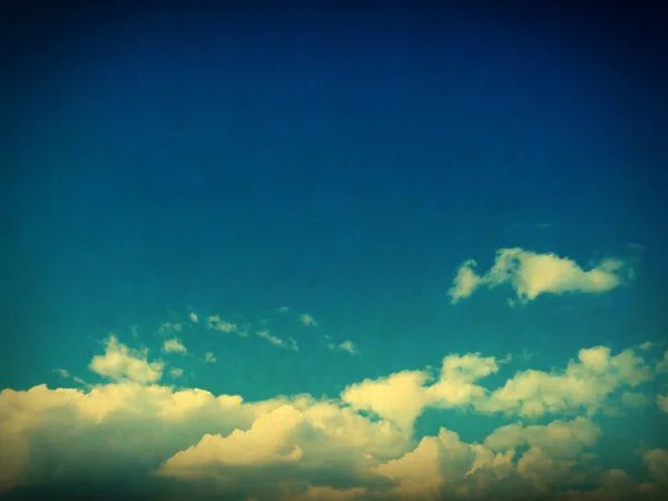 Clouds in blue sky in retro style. — Stock Photo, Image