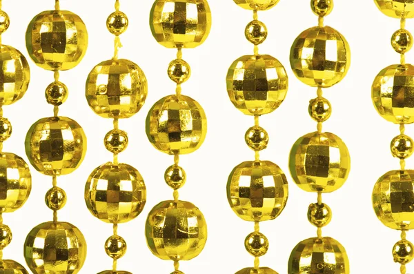 Golden beads with empty copy space — Stock Photo, Image