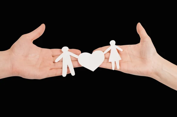 Paper family with a big heart in hands — Stock Photo, Image