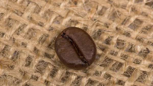 Coffee bean on sack — Stock Photo, Image