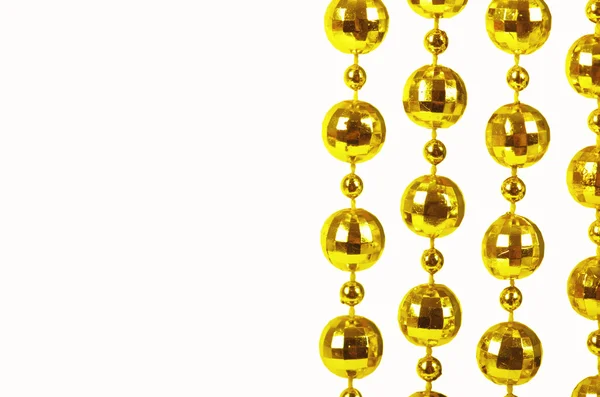 Golden beads with empty copy space — Stock Photo, Image