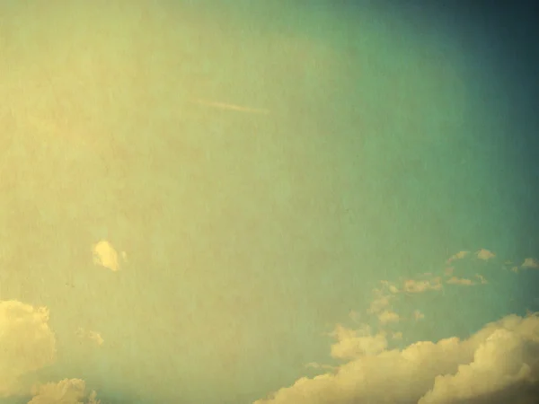 Clouds in blue sky in retro style. — Stock Photo, Image