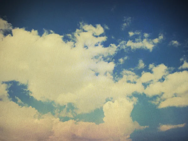 Clouds in blue sky in retro style. — Stock Photo, Image