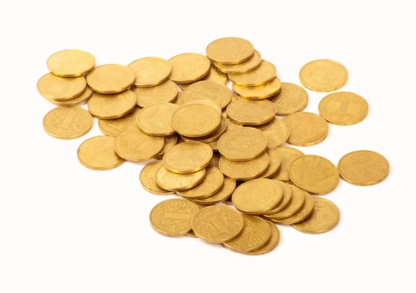 Zlaté mince izolovaných na bílém — Stock fotografie