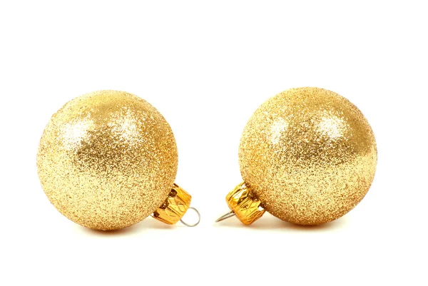 Deux boules de Noël dorées . — Photo