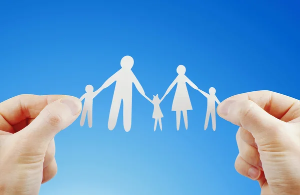 Paper family in hands — Stock Photo, Image